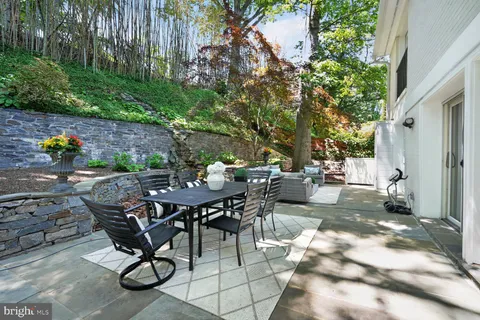a view of a house with a small yard