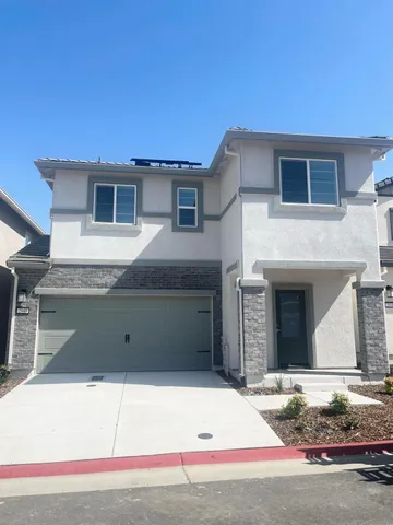 a house view with a outdoor space