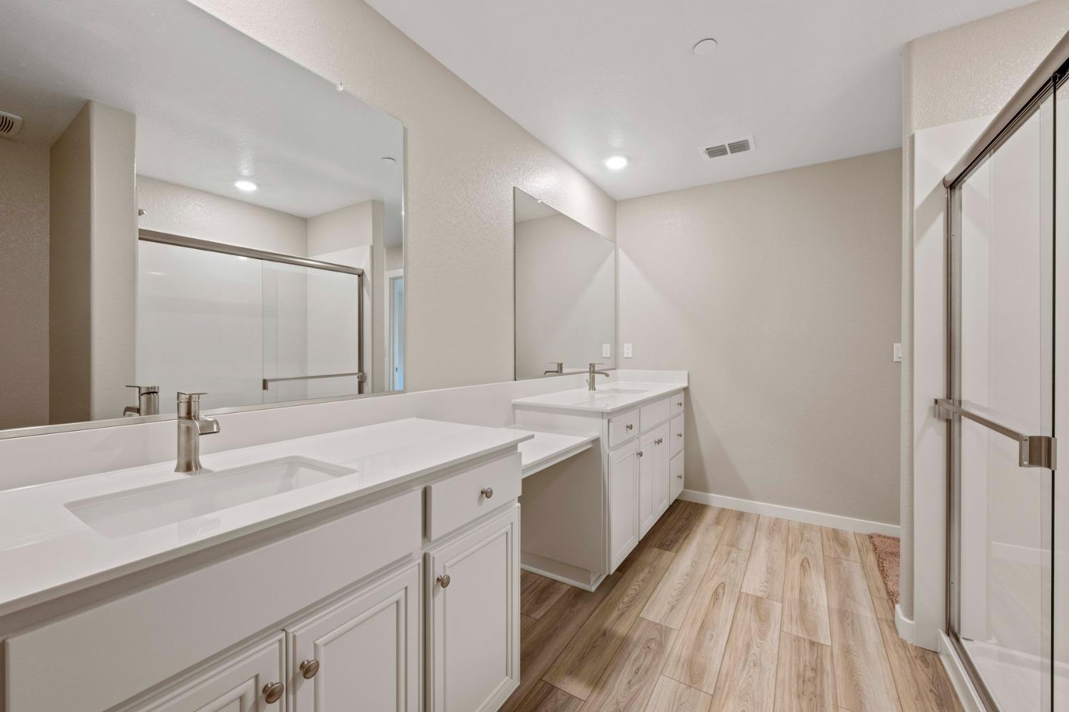 2948 Pulp Ml Lane Lincoln, CA 95648 - Photo 18 of 23 a bathroom with a double vanity sink and mirror