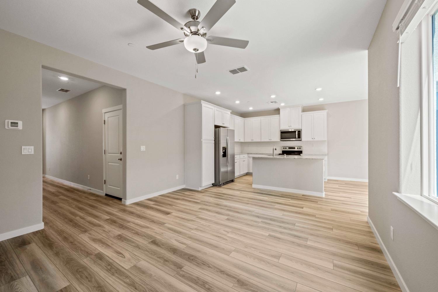 2948 Pulp Ml Lane Lincoln, CA 95648 - Photo 6 of 23 a view of an empty room with kitchen appliances and a window