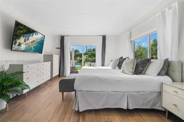 a room with furniture and a wooden floor