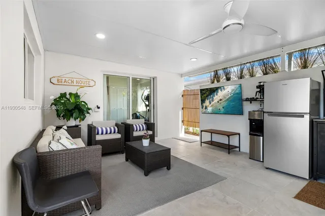 an aerial view of a houses with outdoor space