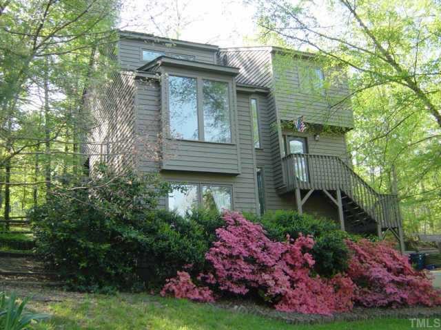 18 Sandstone Ridge Drive Durham, NC 27713 - Photo 1 of 1 a view of a house with a garden
