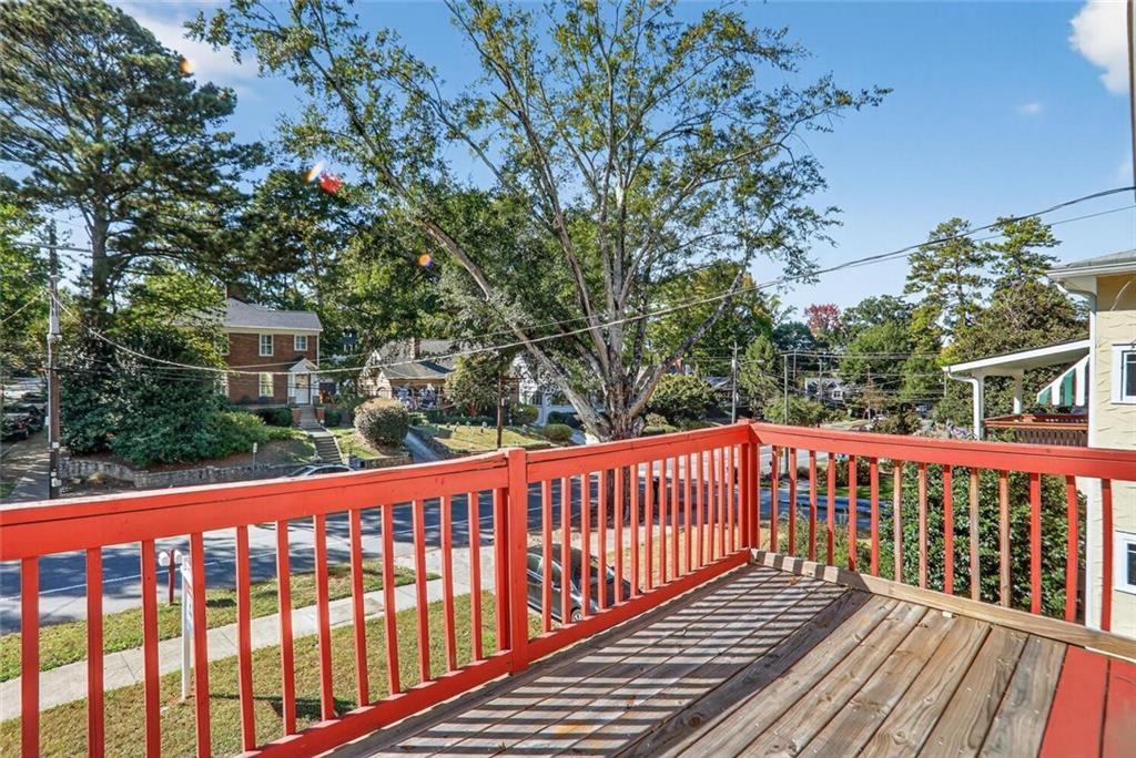 1497 North Morningside Drive Northeast Atlanta, GA 30306 - Photo 16 of 36 a view of a wooden roof deck