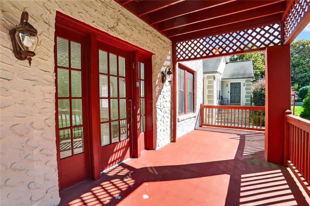 1497 North Morningside Drive Northeast Atlanta, GA 30306 - Photo 2 of 36 a balcony view with a rug