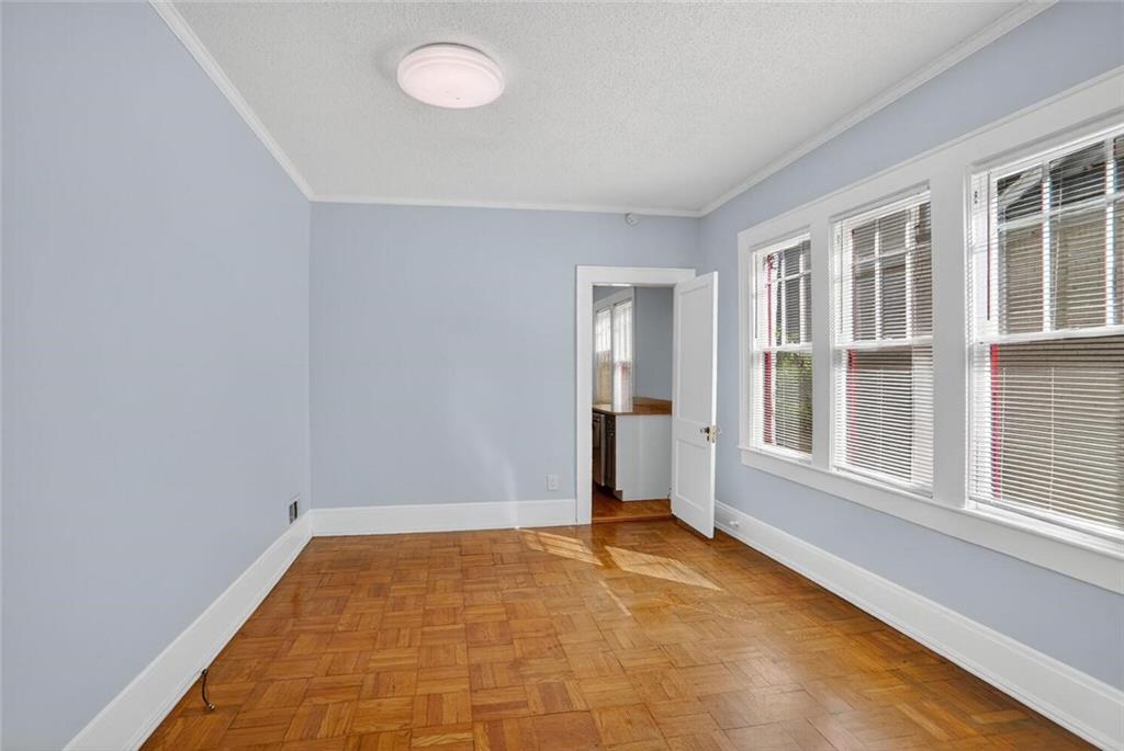 1497 North Morningside Drive Northeast Atlanta, GA 30306 - Photo 21 of 36 an empty room with windows