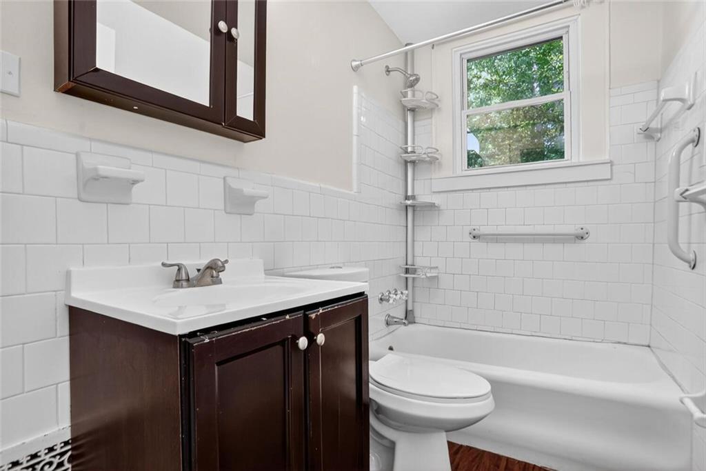 1497 North Morningside Drive Northeast Atlanta, GA 30306 - Photo 28 of 36 a bathroom with a sink toilet and shower