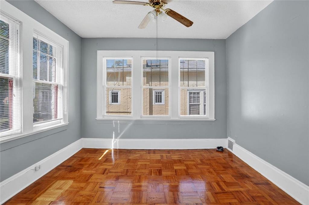 1497 North Morningside Drive Northeast Atlanta, GA 30306 - Photo 6 of 36 a view of an empty room with a window