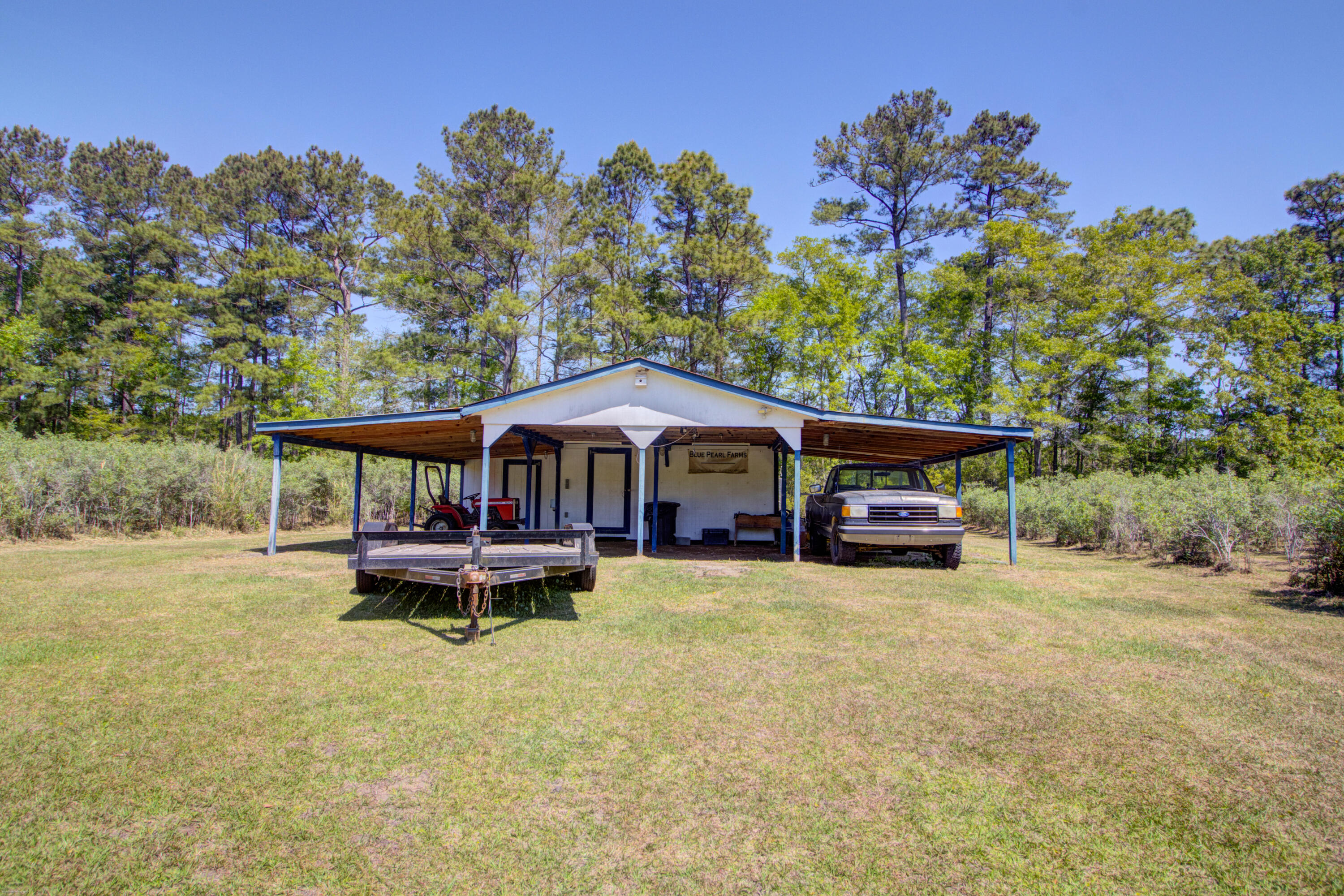 9760 State Rd S-10-1336 McClellanville, SC 29458 - Photo 63 of 98 Packing shed