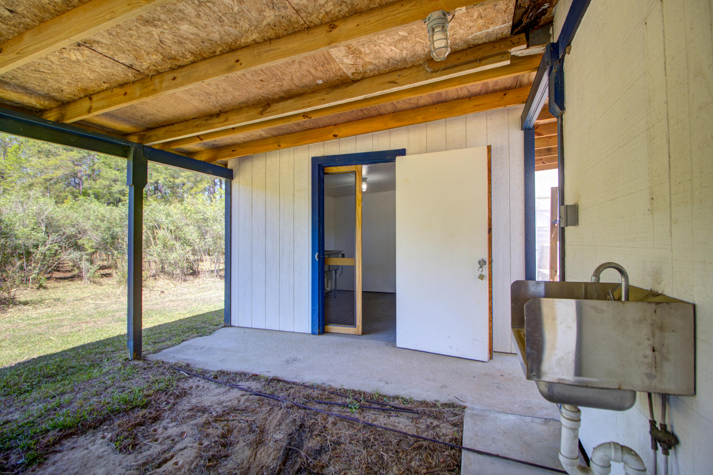 9760 State Rd S-10-1336 McClellanville, SC 29458 - Photo 67 of 98 Packing shed-underneath2