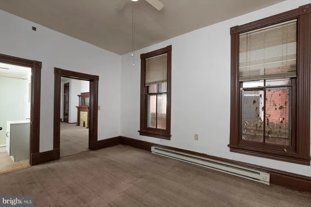 a view of an empty room with window