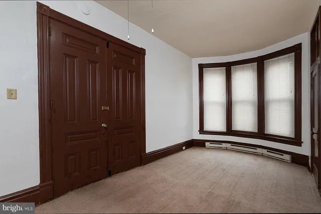 an empty room with windows