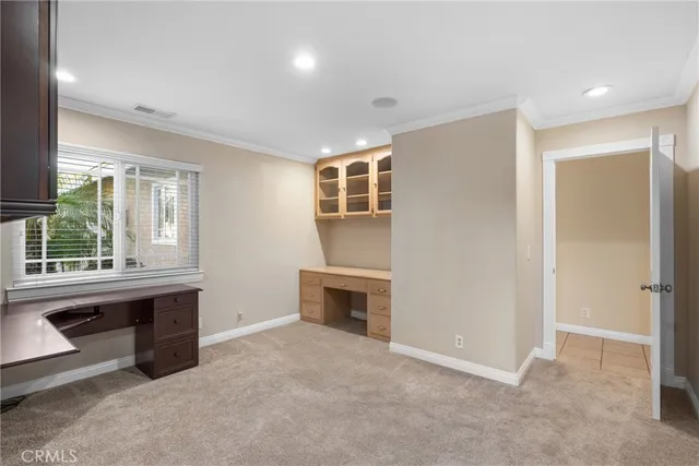 a view of empty room with windows