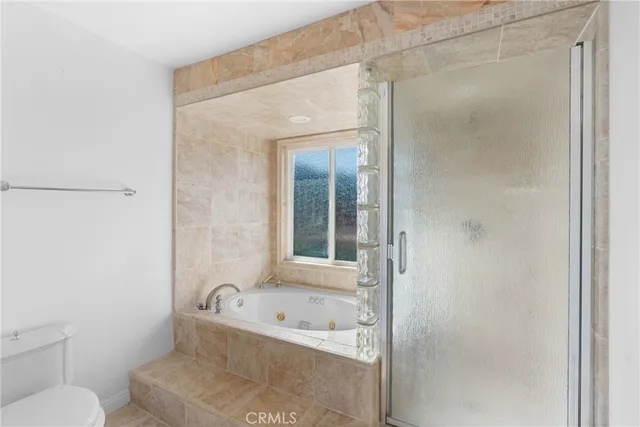 a view of a backyard with a sitting area