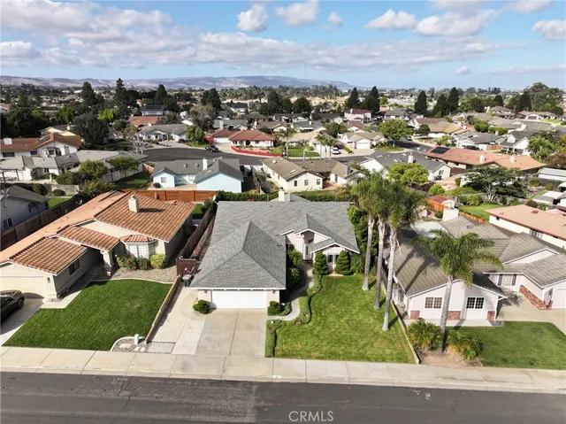 an aerial view of a city with lots of residential buildings