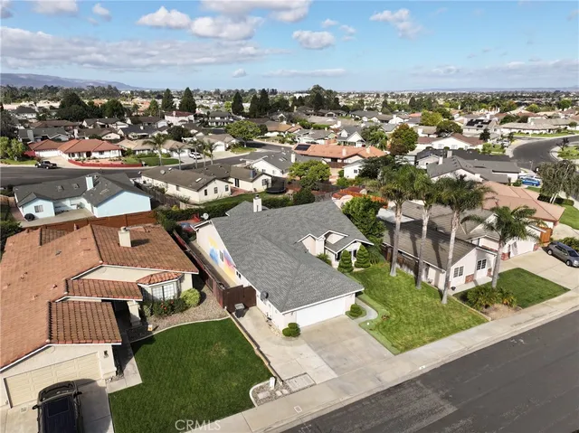 an aerial view of residential building with parking space
