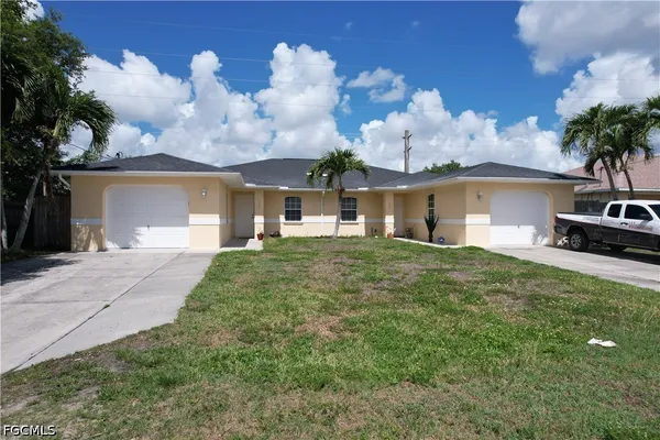 front view of a house with a yard