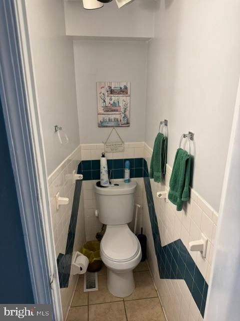 4603 Raleigh Road Temple Hills, MD 20748 - Photo 28 of 40 a white toilet sitting next to a sink