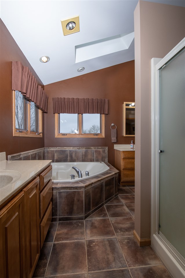 12410 Beaverton Road Poplar Grove, IL 61065 - Photo 16 of 37 a kitchen with a sink a counter top space and appliances