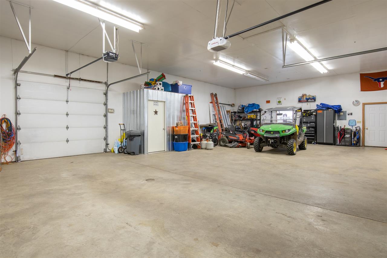 12410 Beaverton Road Poplar Grove, IL 61065 - Photo 32 of 37 a view of a garage with storage