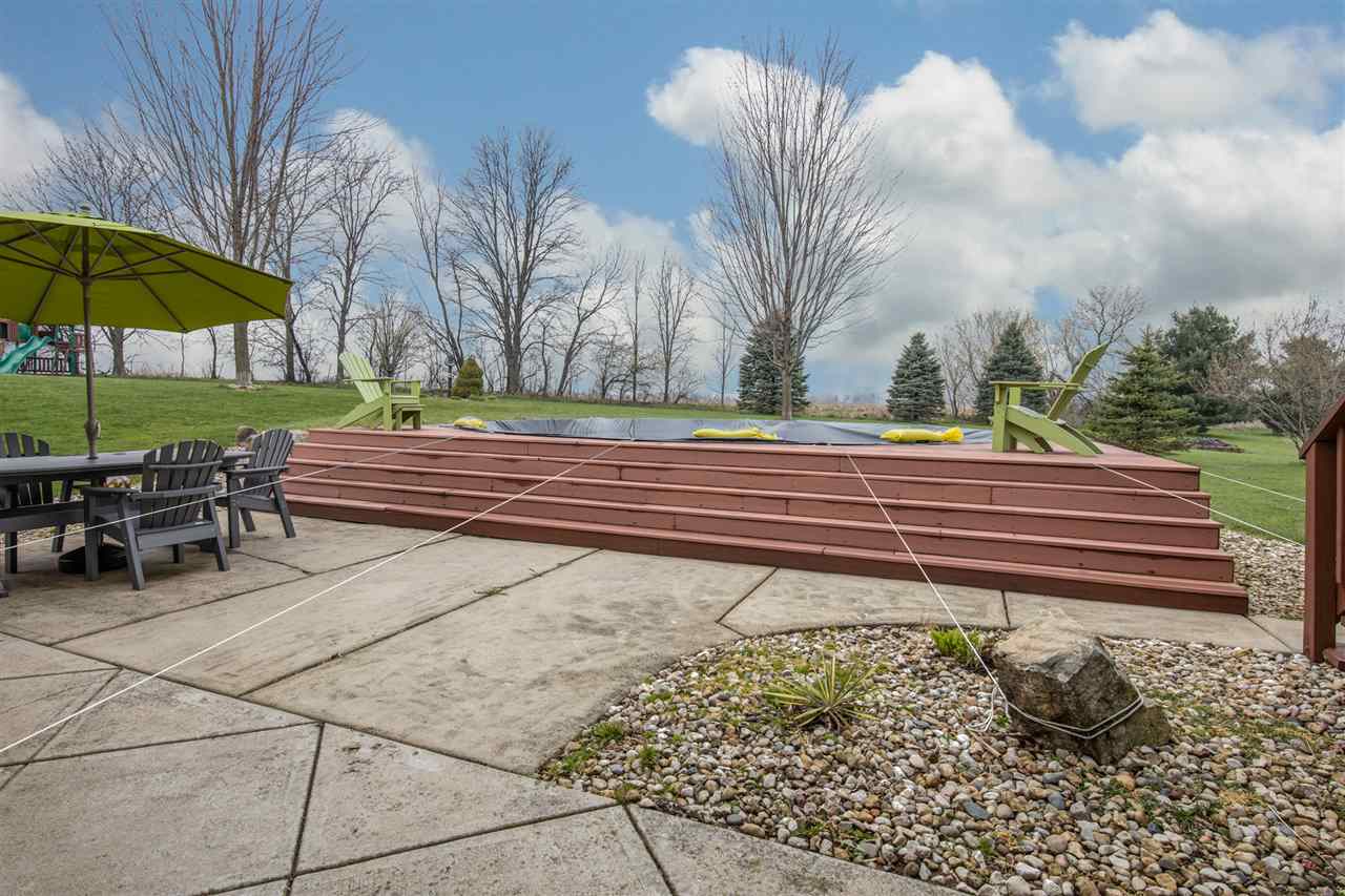 12410 Beaverton Road Poplar Grove, IL 61065 - Photo 33 of 37 a view of a backyard with sitting area