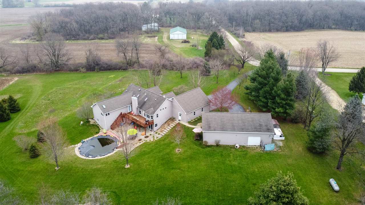 12410 Beaverton Road Poplar Grove, IL 61065 - Photo 34 of 37 an aerial view of a house with garden space and street view