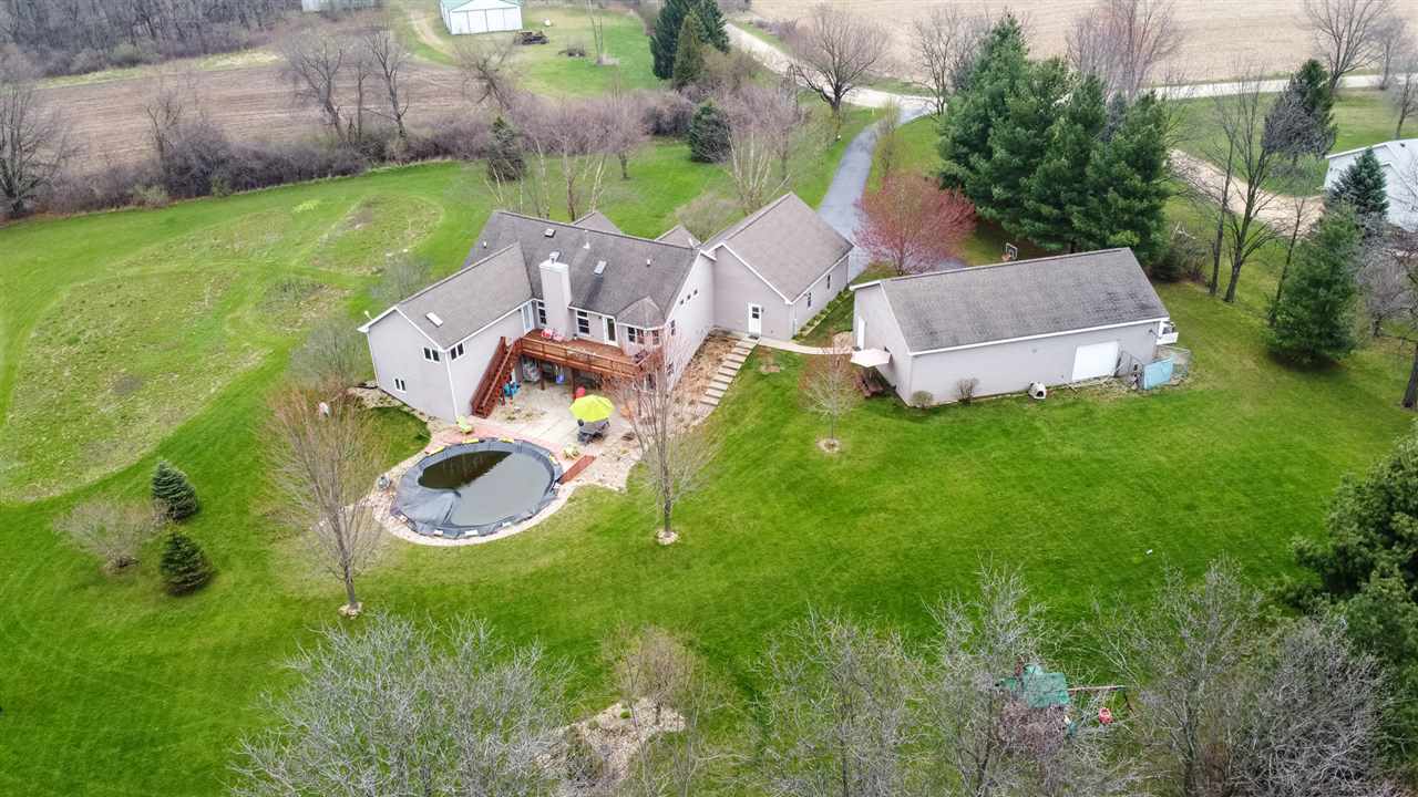 12410 Beaverton Road Poplar Grove, IL 61065 - Photo 35 of 37 an aerial view of a house with backyard swimming pool and outdoor seating