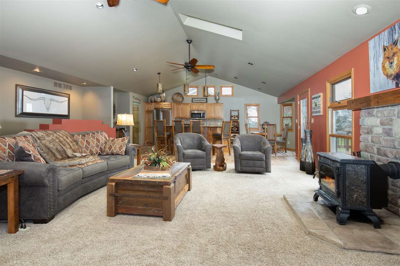 12410 Beaverton Road Poplar Grove, IL 61065 - Photo 7 of 37 a living room with furniture and a large window