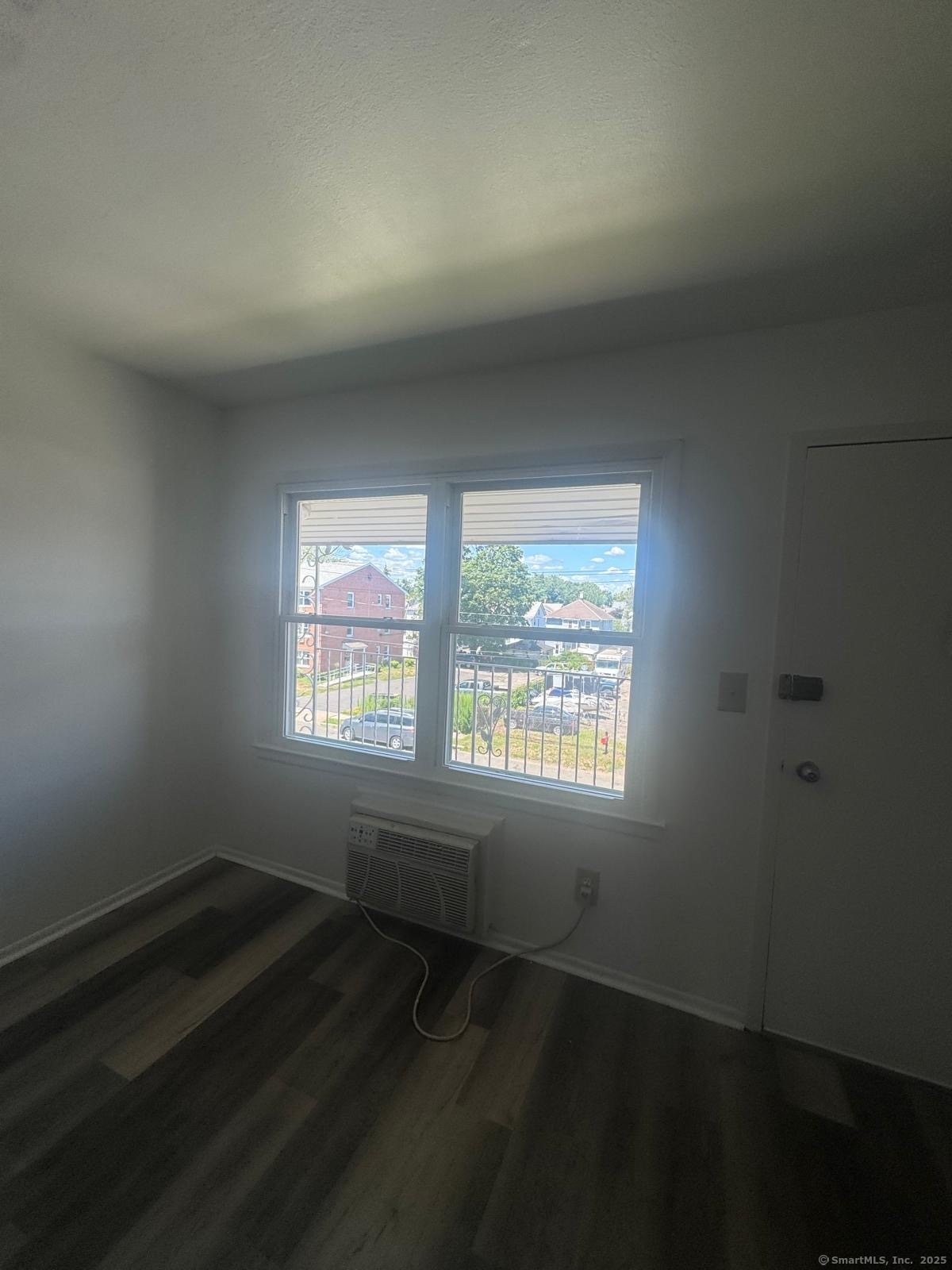 169 Birdseye Street, Unit C7 Bridgeport, CT 06604 - Photo 4 of 4 a view of an empty room and window