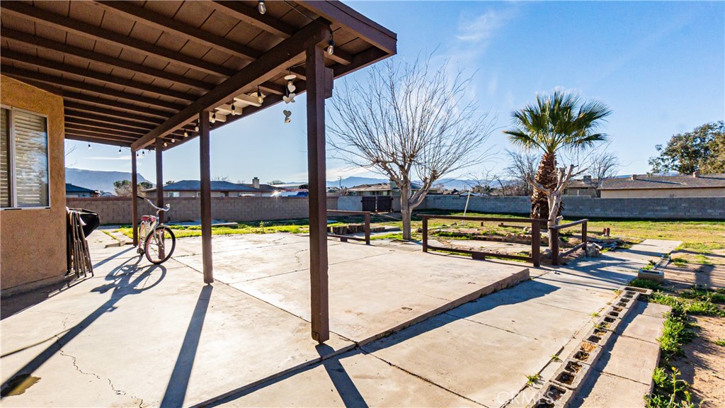 22993 Eyota Road Apple Valley, CA 92308 - Photo 28 of 38 a view of swimming pool with outdoor seating