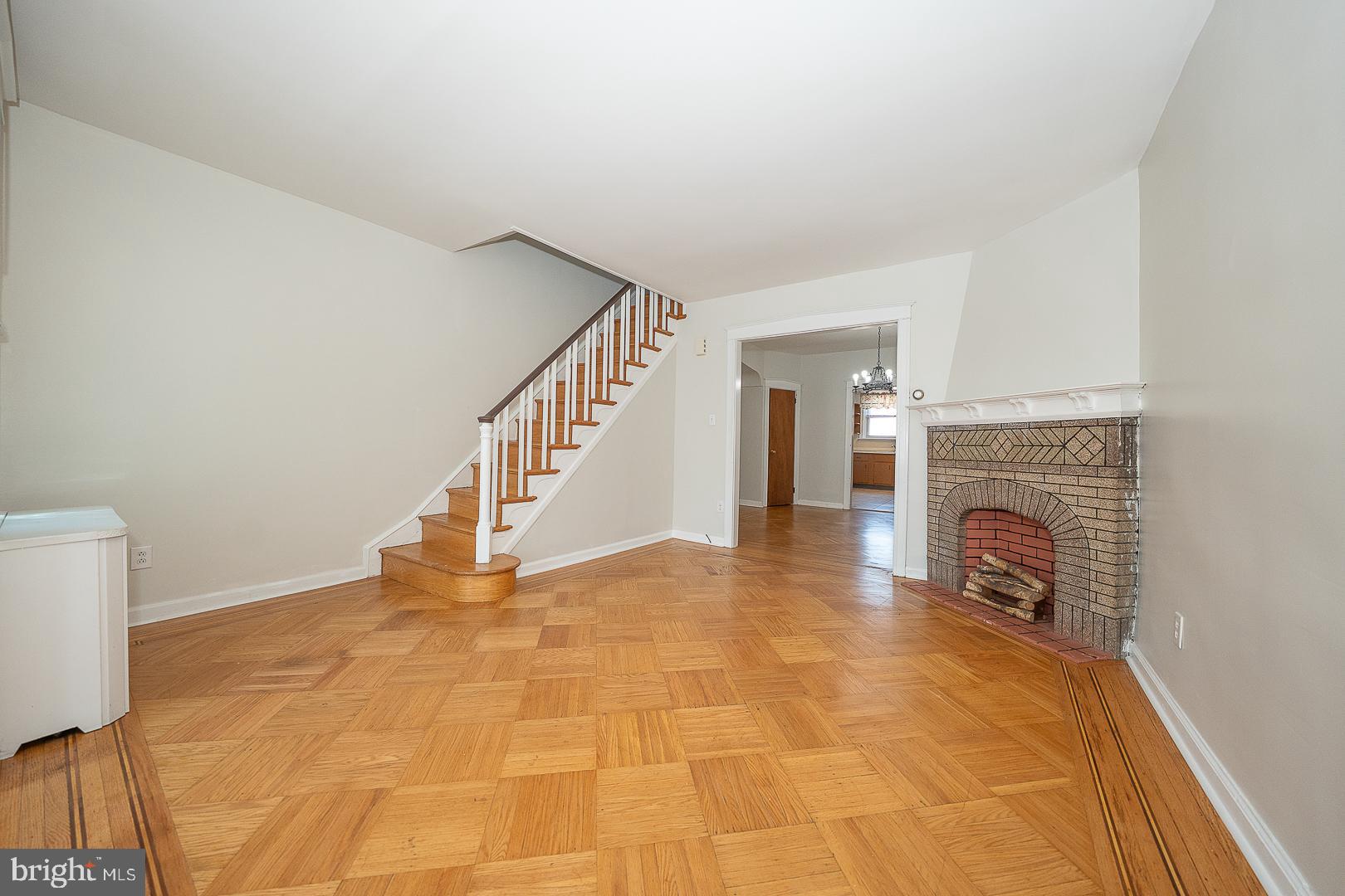 628 Gerhard Street Philadelphia, PA 19128 - Photo 6 of 30 Living Room with decorative fireplace