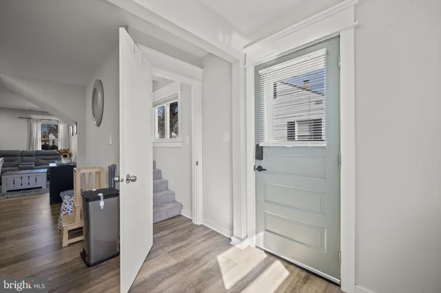 a bedroom with furniture and a baby crib
