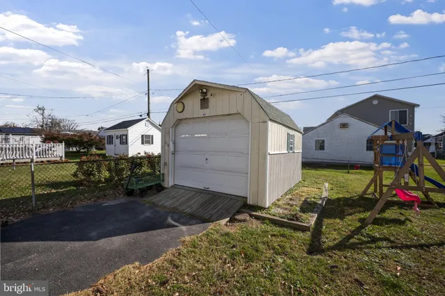 a childrens park with lots of swings and slides