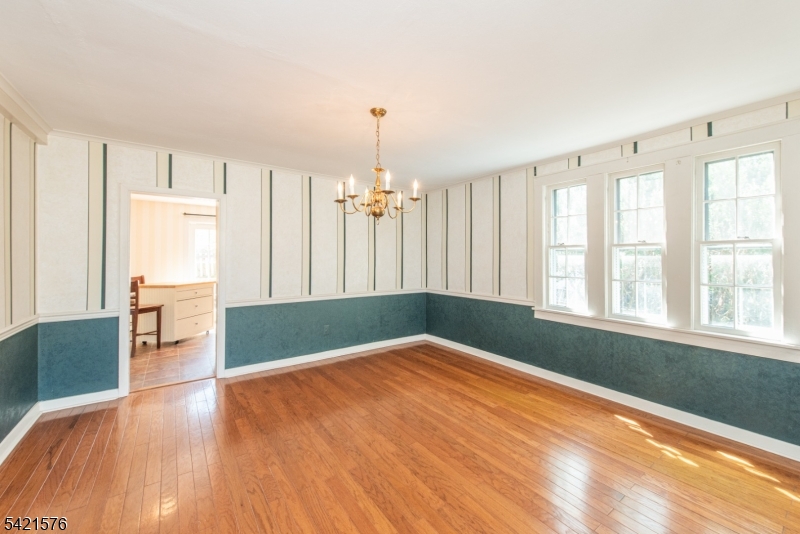 10 Butler Pass Mount Tabor, NJ 07878 - Photo 10 of 19 a view of empty room with wooden floor and fan