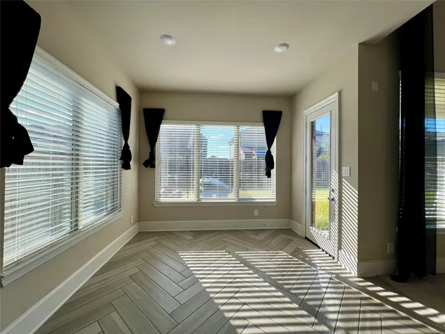 a view of a room with a large window