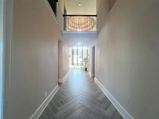 a view of entryway with wooden floor