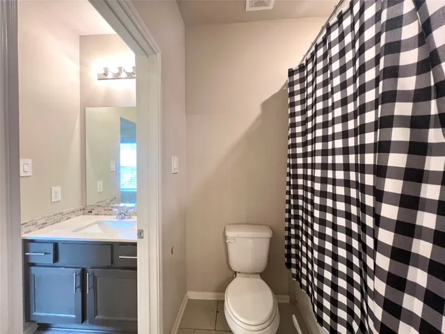 an empty room with closet area