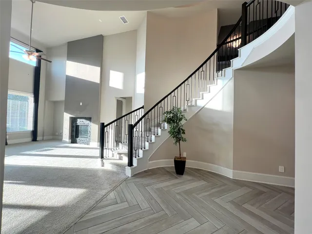 a view of a house with swimming pool in front of it
