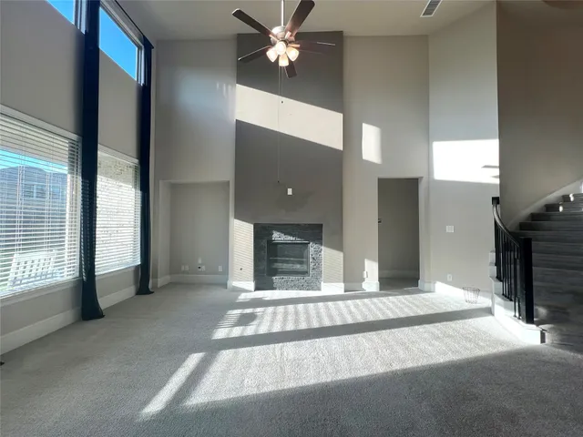 a bedroom with a bed and a fireplace