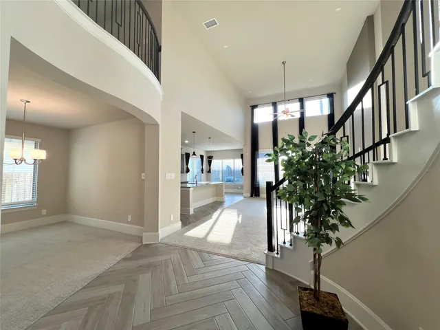 a view of entryway with livingroom and wooden floor