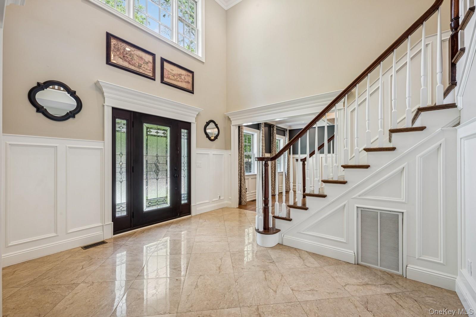 33 Bacon Road St. James, NY 11780 - Photo 5 of 48 a view of entryway and hall with wooden floor