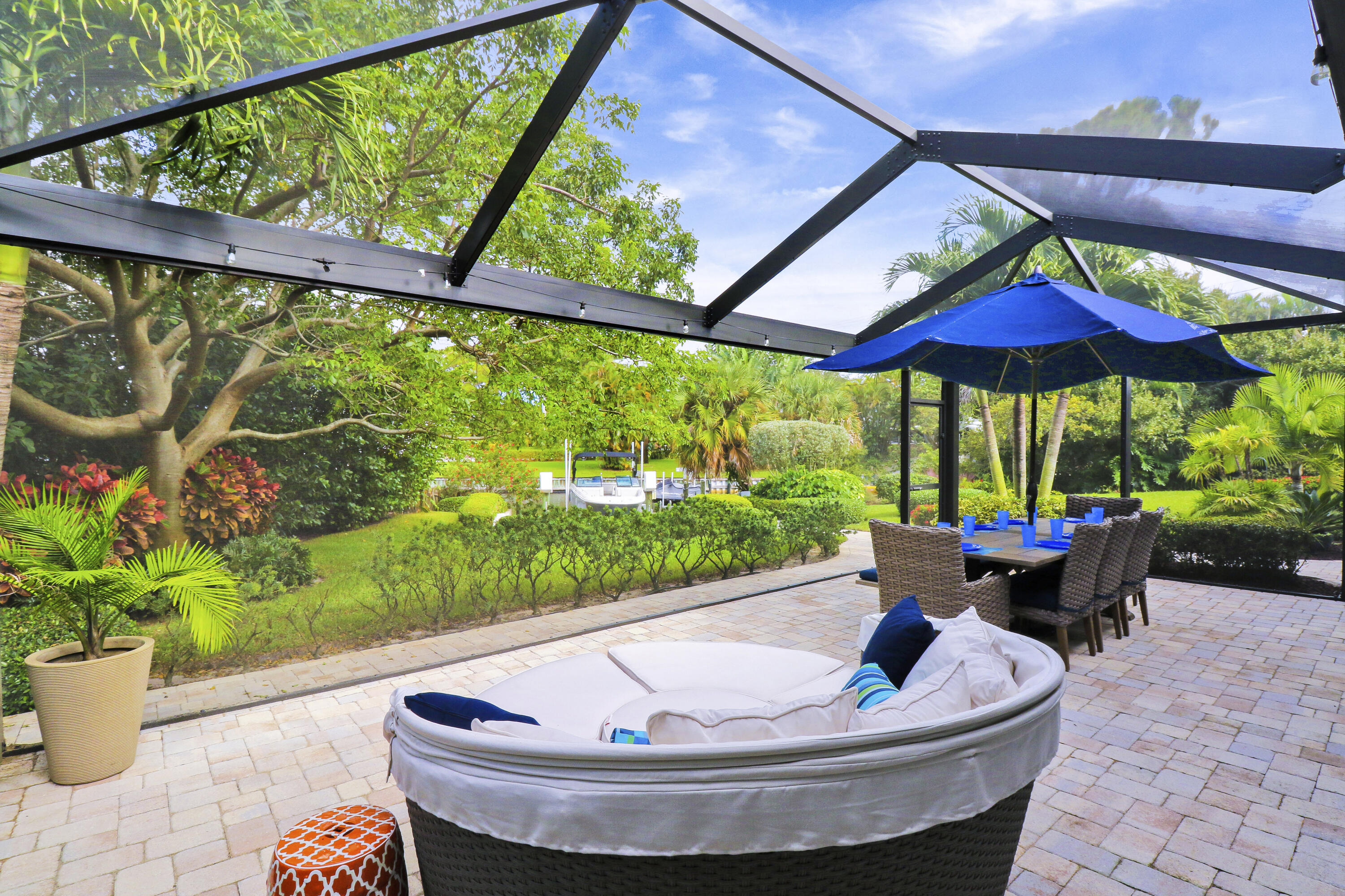 2416 Northwest Fork Road Stuart, FL 34994 - Photo 44 of 53 Relaxing in the lanai watching the boats