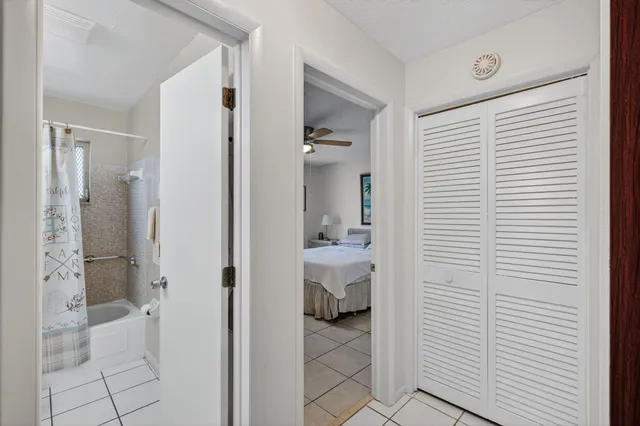 a bathroom with a shower and a sink