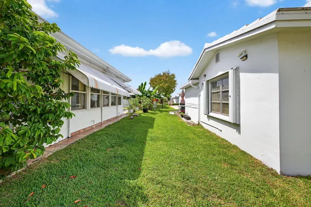 a house view with a garden space