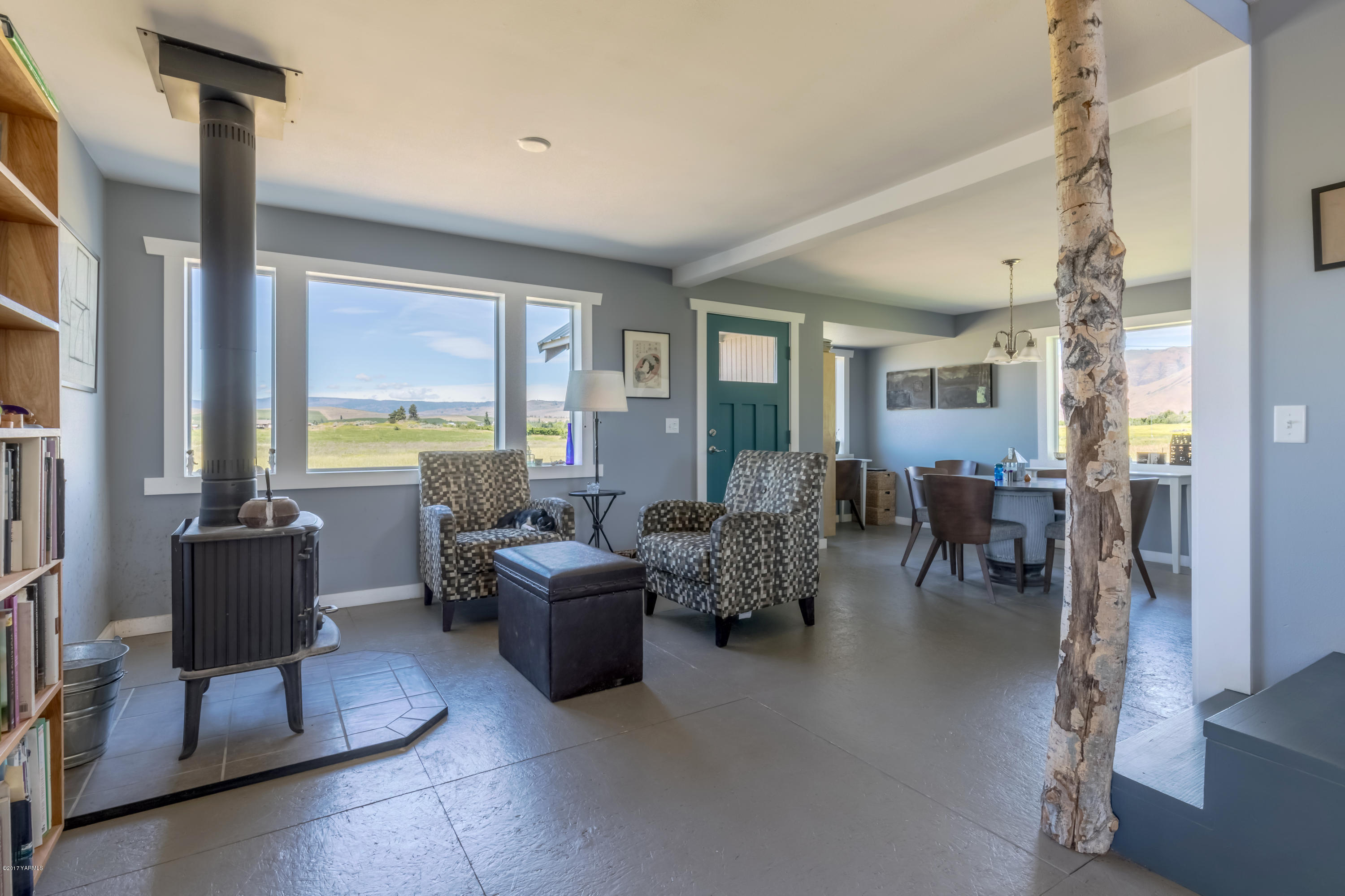 1091 Beffa Road Tieton, WA 98947 - Photo 1 of 34 a living room with fireplace furniture and a large window