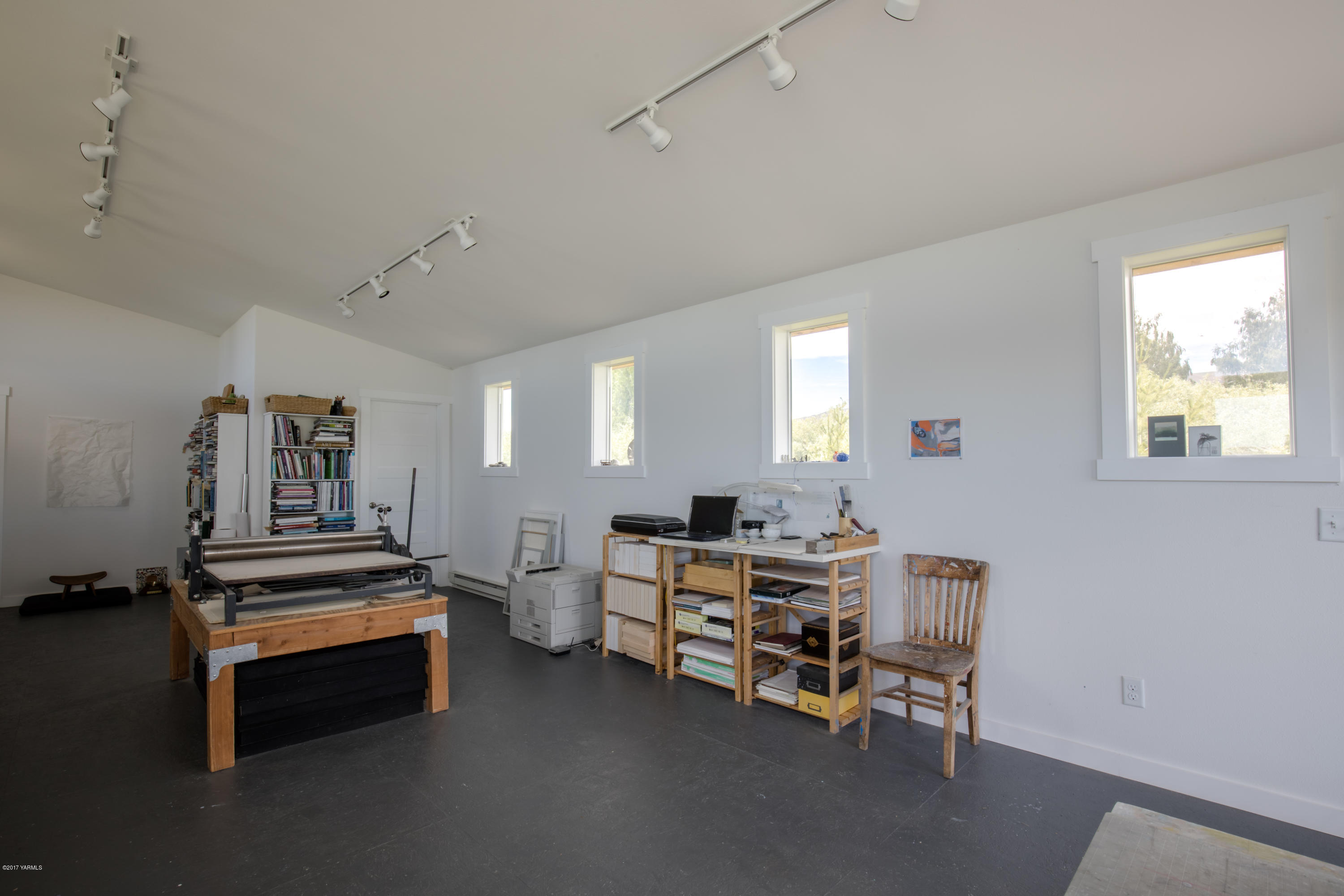 1091 Beffa Road Tieton, WA 98947 - Photo 18 of 34 a view of a workspace with furniture and a window