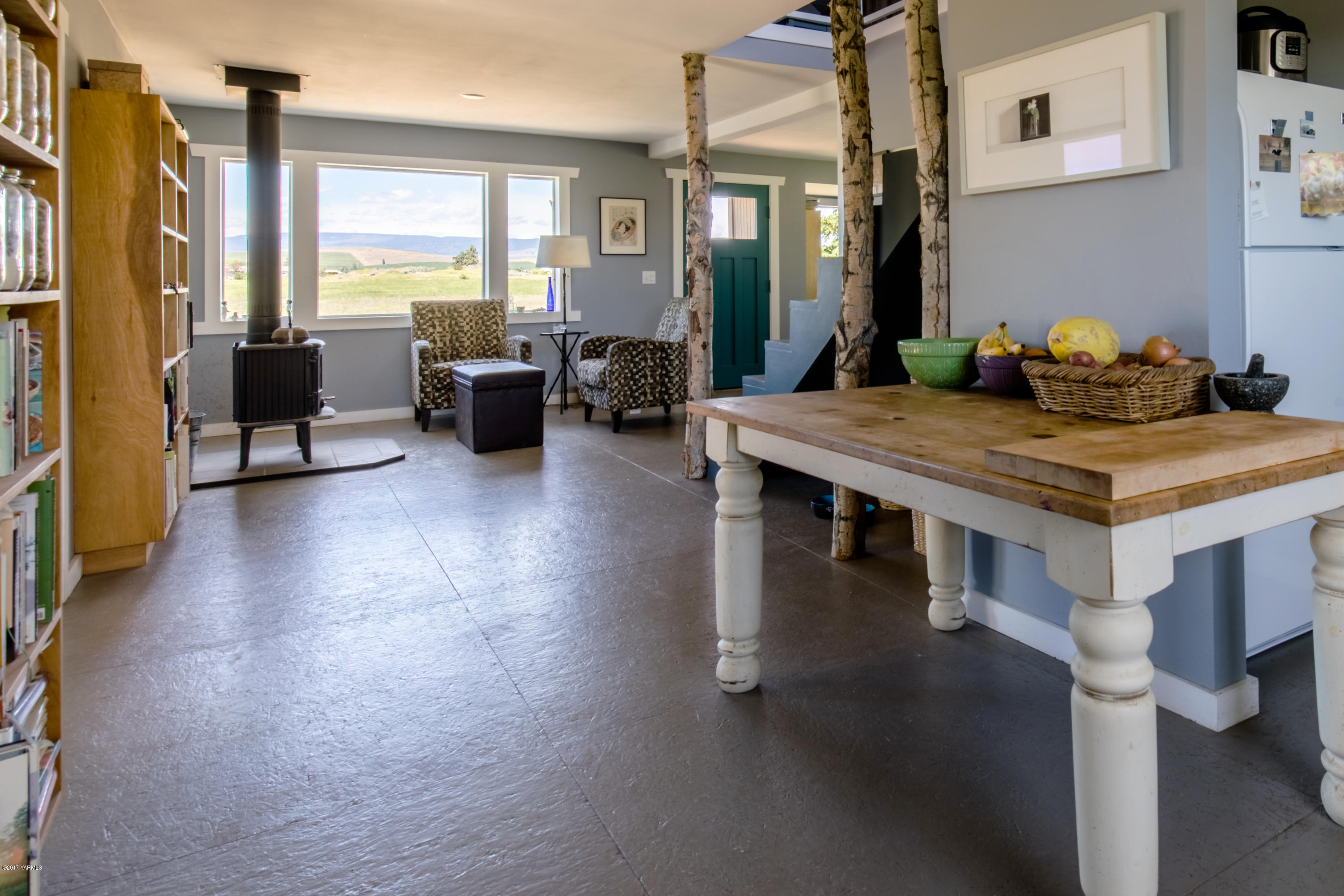 1091 Beffa Road Tieton, WA 98947 - Photo 6 of 34 a view of a dining room with furniture window and wooden floor