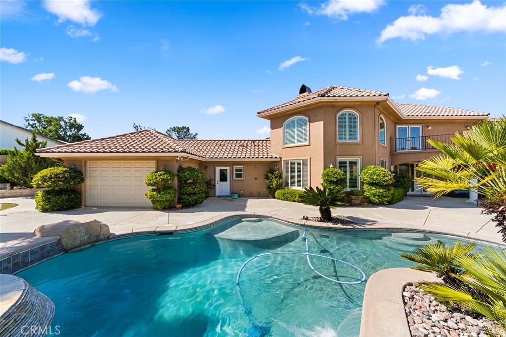 38136 Butterfly Court Yucaipa, CA 92399 - Photo 24 of 71 a front view of a house with a yard