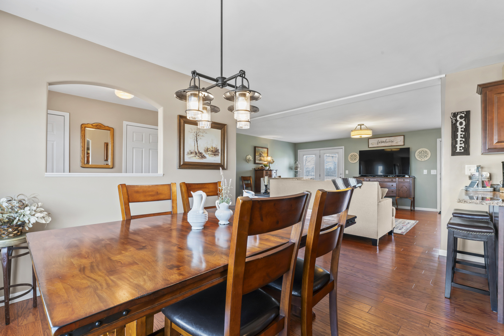 3015 North 1600 East Road Clifton, IL 60927 - Photo 12 of 46 a view of a dining room with furniture wooden floor and chandelier