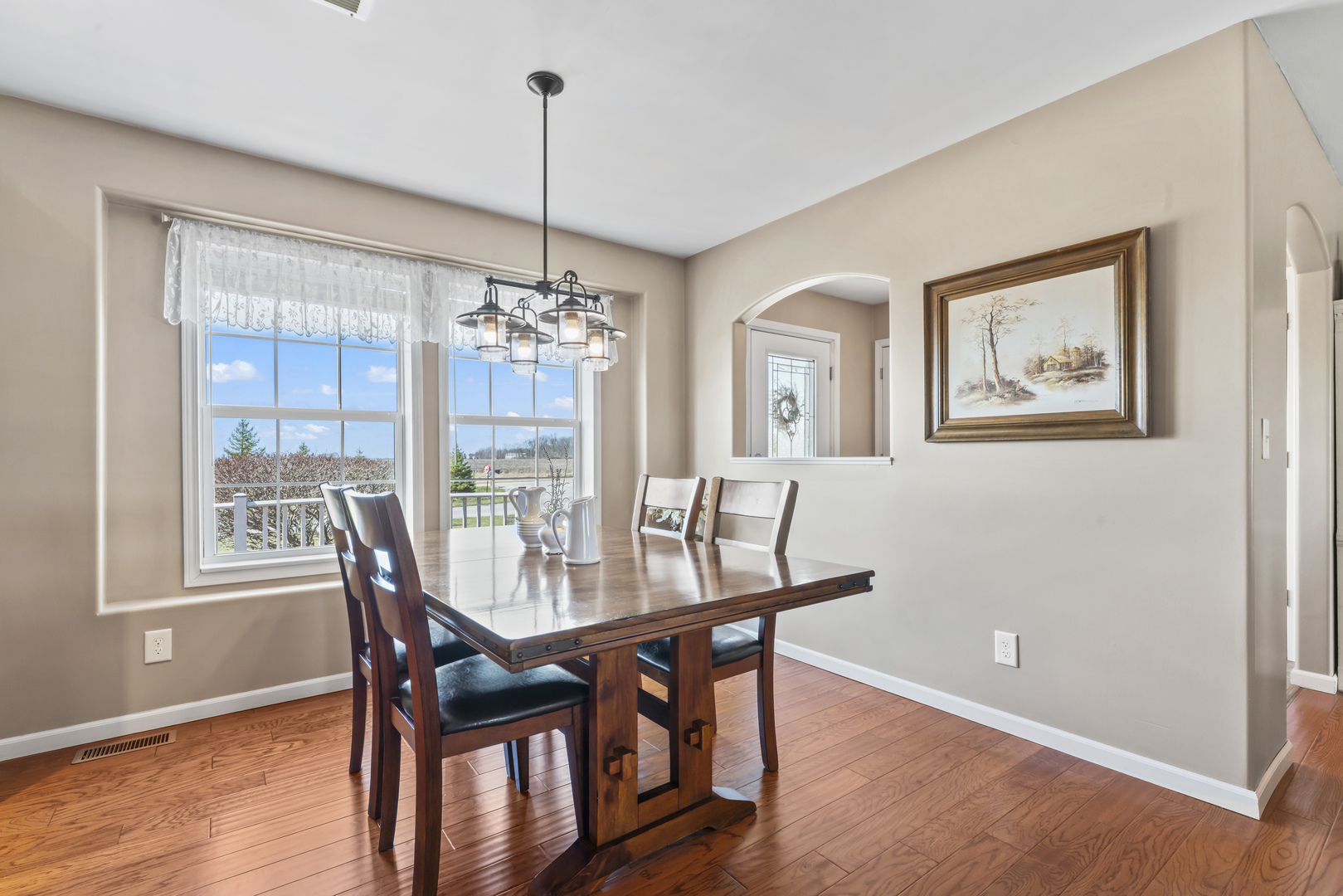3015 North 1600 East Road Clifton, IL 60927 - Photo 13 of 46 a view of a dining room with furniture window and wooden floor